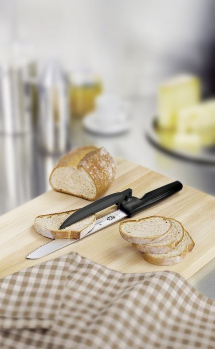 Couteau à pain avec guide réglable